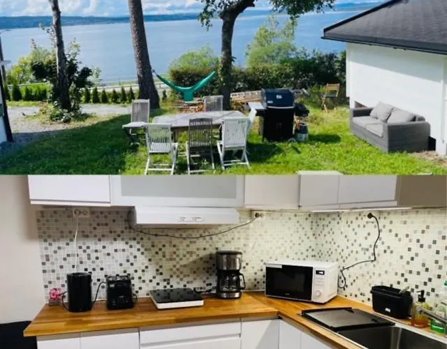 Nice Apartment With1 Bedroom Separate Living Room With A Sofa Bed And A Tiny Kitchen A Bathroom Located In Nordstrand Near By The Sea For 3 Guests With A Garden And Grill 5 Extra Guests With Extra Cost In The Cabin With Sea View Just Outside The Apar